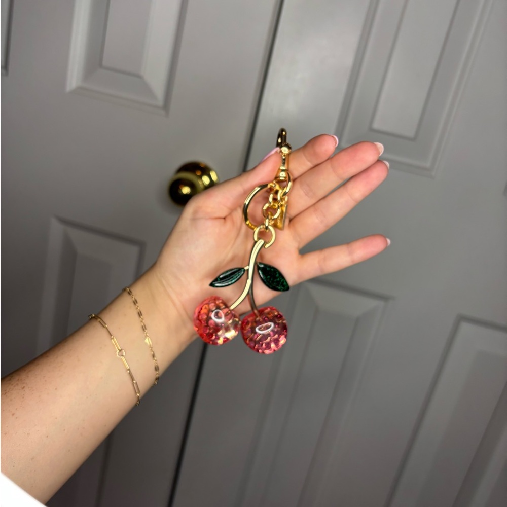 Coach Cherry Keychain with Gold and Green